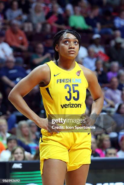 Indiana Fever guard Victoria Vivians glances at the scoreboard during a WNBA game between Indiana Fever and Connecticut Sun on June 27 at Mohegan Sun...