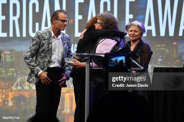 Recording Artist Dianne Davidson presents the American Eagle Award to The Manhattan Transfer during the National Music Council American Eagle Awards...