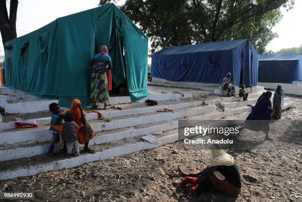 African migrants who were arrested in Algeria while illegally attempting to get to Europe, are seen in the refugee camp located in the Zeralda...