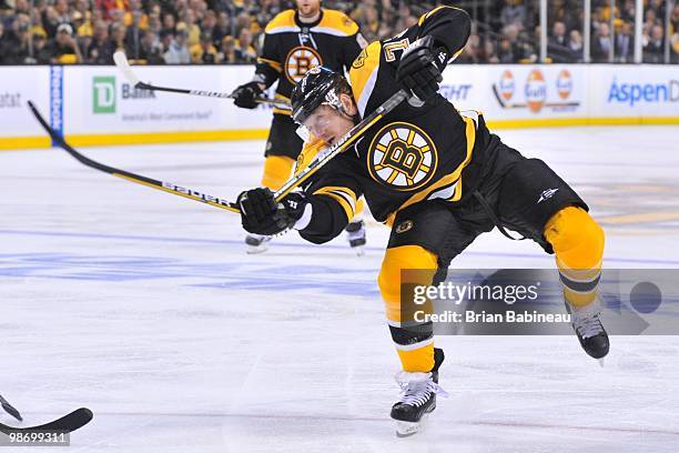 Michael Ryder of the Boston Bruins shoots the puck and breaks his stick in half against the Buffalo Sabres in Game Six of the Eastern Conference...