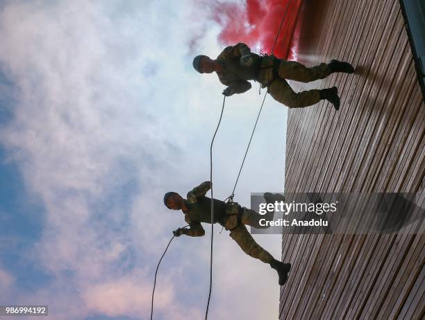 Officer candidates performs after they completed 43 weeks commando basic course at Foca Gendarmerie Commando School and Training Center Command in...