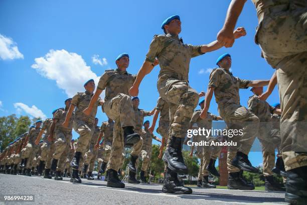 Officer candidates parade after they completed 43 weeks commando basic course at Foca Gendarmerie Commando School and Training Center Command in...