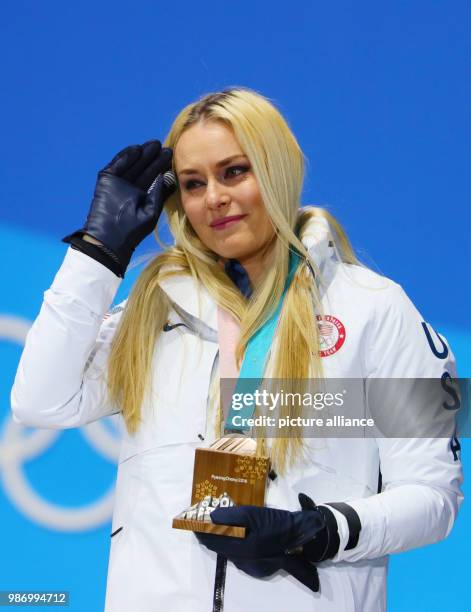 Lindsey Vonn from the US standing on the podium during the award ceremony of the women's alpine skiing event of the 2018 Winter Olympiucs in...