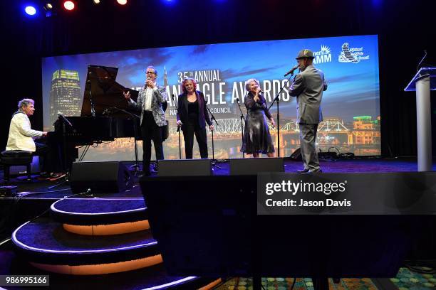 Chick Corea; The Manhattan Transfer and Hubert Laws perform on stage during the National Music Council American Eagle Awards Dinner honoring Chick...