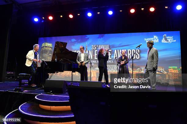Chick Corea; The Manhattan Transfer and Hubert Laws perform on stage during the National Music Council American Eagle Awards Dinner honoring Chick...