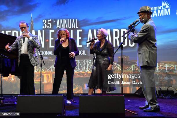 Hubert Laws and The Manhattan Transfer perform on stage during the National Music Council American Eagle Awards Dinner honoring Chick Corea and The...
