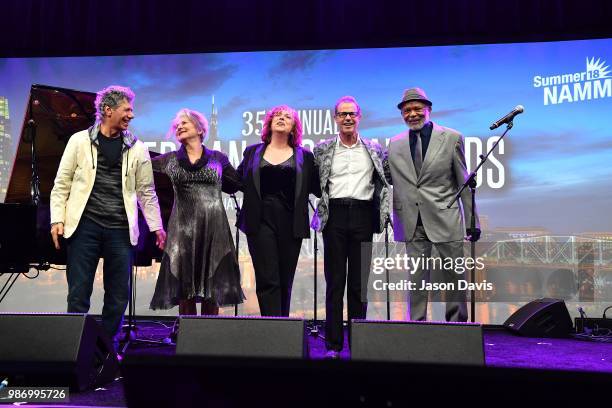 Chick Corea, The Manhattan Transfer and Hubert Laws perform on stage during the National Music Council American Eagle Awards Dinner honoring Chick...