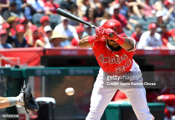 Chris Young of the Los Angeles Angels of Anaheim backs out of the way of an inside pitch during the game against the Toronto Blue Jays at Angel...
