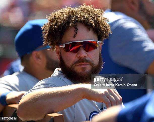 Russell Martin of the Toronto Blue Jays sits in the dugout during the game against the Los Angeles Angels of Anaheim at Angel Stadium on June 24,...