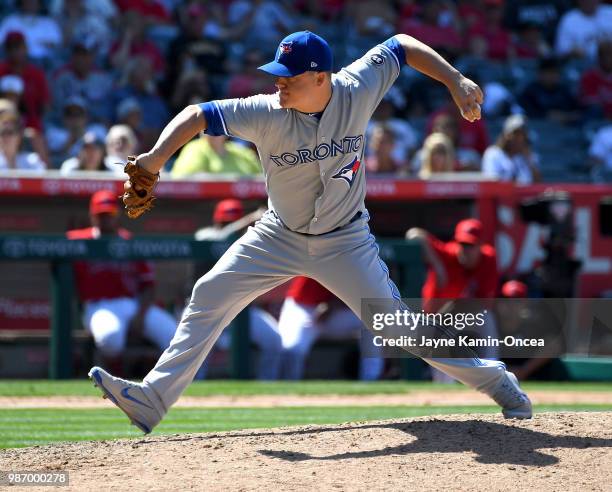 Aaron Loup of the Toronto Blue Jays pitches in the game against the Los Angeles Angels of Anaheim at Angel Stadium on June 24, 2018 in Anaheim,...