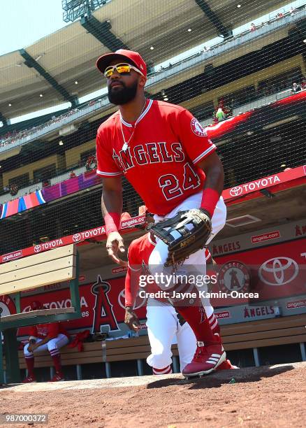 Chris Young of the Los Angeles Angels of Anaheim runs on to the field at the start of the game against the Toronto Blue Jays of Anaheim at Angel...