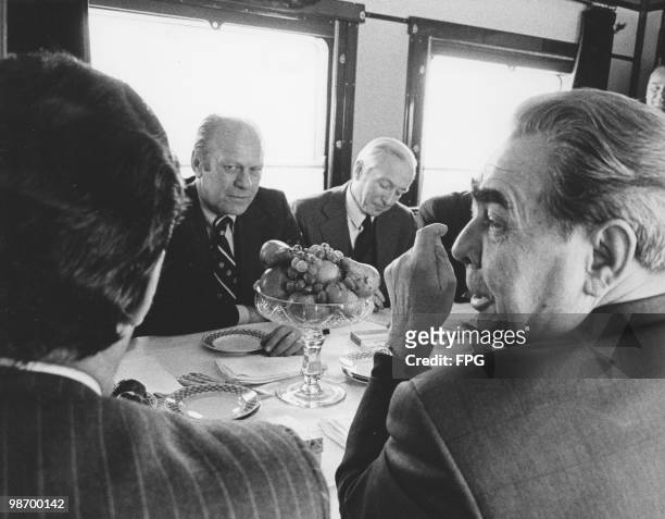 President Gerald Ford meets Soviet General Secretary Leonid Brezhnev on a train in Vladivostok, 23rd November 1974. On the President's left is Walter...