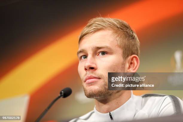 Dpatop - RB Leipzig midfielder Konrad Laimer attends a press conference ahead of Thursday's UEFA Europa League round of 32 soccer match between RB...