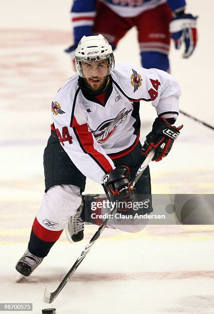 Justin Shugg of the Windsor Spitfires skates with the puck in Game 6 of the Western Conference Final against the Kitchener Rangers on April 23, 2010...