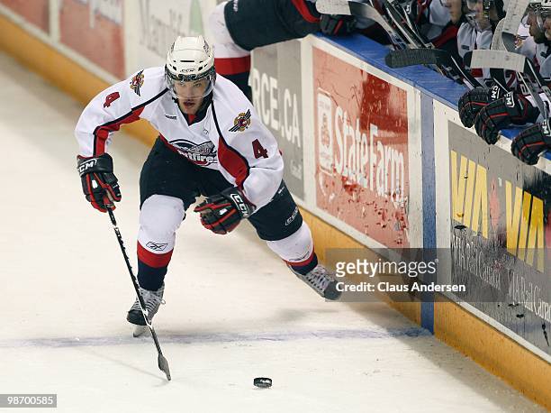 Taylor Hall of the Windsor Spitfires skates with the puck in Game 6 of the Western Conference Final against the Kitchener Rangers on April 23, 2010...