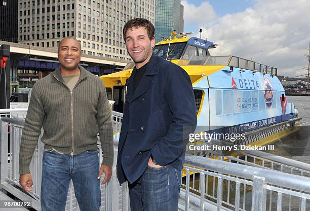 Former New York Yankee Bernie Williams and New York Met Jeff Francoeur attend the christening of Delta's Baseball Water Taxis at Pier 11 on April 27,...