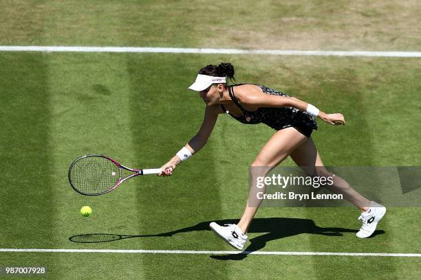 Agnieszka Radwanska of Poland in action against Aryna Sabalenka of Belarus during her semi-final match on day eight of the Nature Valley...