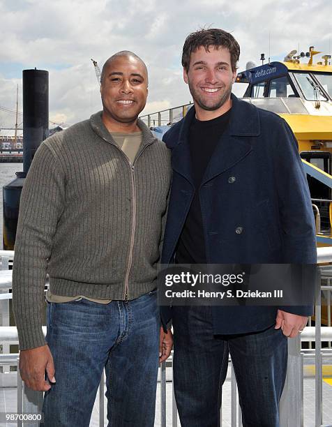 Former New York Yankee Bernie Williams and New York Met Jeff Francoeur attend the christening of Delta's Baseball Water Taxis at Pier 11 on April 27,...