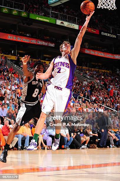 Goran Dragic of the Phoenix Suns dribble drives baseline for the layup against Roger Mason Jr. #8 of the San Antonio Spurs during the game at U.S....
