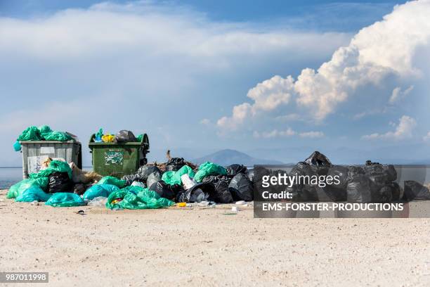 trash problems on the island of corfu. - industrial garbage bin stock pictures, royalty-free photos & images
