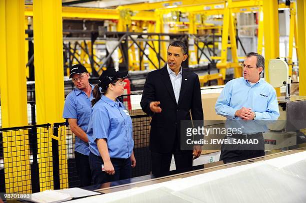 President Barack Obama tours the Siemens Energy Inc. Facility in Fort Madison, Iowa, on April 27, 2010 on another leg of the White House to Main...
