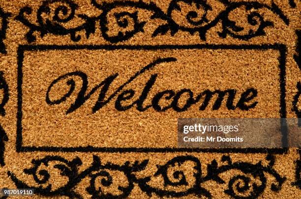 welcome mat - welcome mat isolated stock pictures, royalty-free photos & images