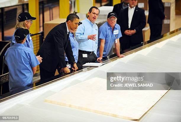 President Barack Obama tours the Siemens Energy Inc. Facility in Fort Madison, Iowa, on April 27, 2010 on another leg of the White House to Main...