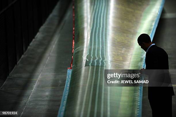 President Barack Obama tours the Siemens Energy Inc. Facility in Fort Madison, Iowa, on April 27, 2010 on another leg of the White House to Main...