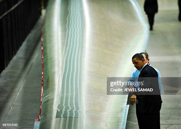 President Barack Obama tours the Siemens Energy Inc. Facility in Fort Madison, Iowa, on April 27, 2010 on another leg of the White House to Main...