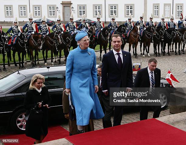 Svetlana Medvedeva , Queen Margrethe of Denmark and Russian President Dmitry Medvedev walk up the stairs of Fredensborg Palace, on April 2010 in the...