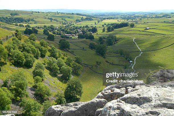 beautiful landscape of the yorkshire dales england from malham cove - north yorkshire stock pictures, royalty-free photos & images