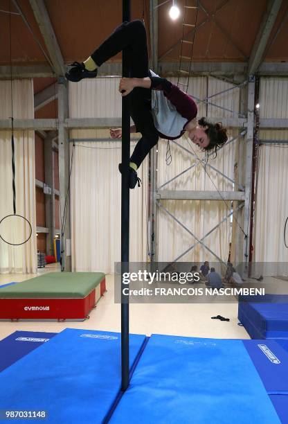 Student of the National Circus Art Center performs on June 21, 2018 in Châlons-en-Champagne, northern France.