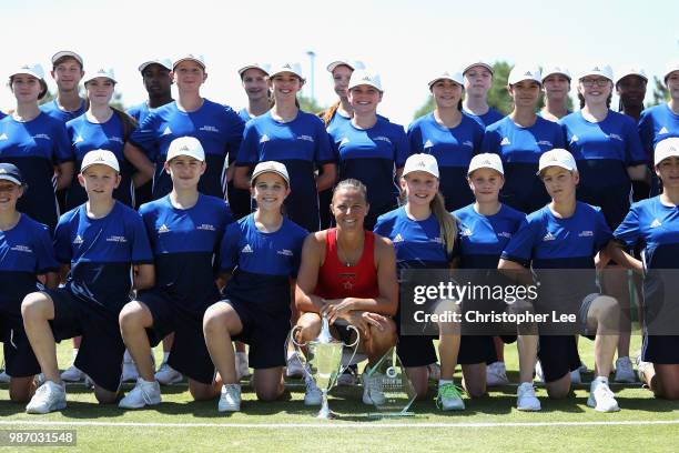 Kirsten Flipkins of Belgium poses with the Winners Trophies after her victory over Katie Boulter of Great Britain in the Womens Singles Final match...