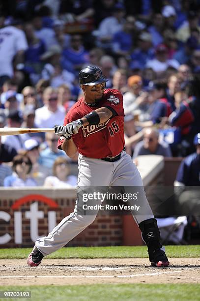 Carlos Lee of the Houston Astros bats against the Chicago Cubs on April 16, 2010 at Wrigley Field in Chicago, Illinois. The Cubs defeated the Astros...