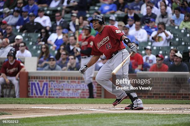 Carlos Lee of the Houston Astros bats against the Chicago Cubs on April 16, 2010 at Wrigley Field in Chicago, Illinois. The Cubs defeated the Astros...