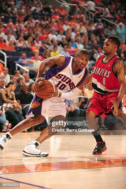 Leandro Barbosa of the Phoenix Suns drives the ball against Patrick Mills of the Portland Trail Blazers in Game Two of the Western Conference...