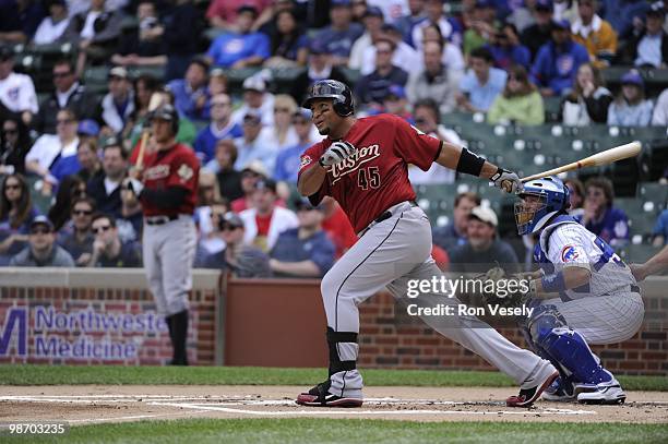 Carlos Lee of the Houston Astros bats against the Chicago Cubs on April 16, 2010 at Wrigley Field in Chicago, Illinois. The Cubs defeated the Astros...