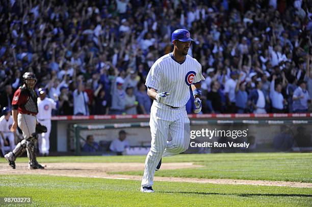 Derrek Lee of the Chicago Cubs hits a three run home run in the seventh inning against the Houston Astros on April 16, 2010 at Wrigley Field in...