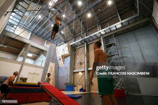 Students of the National Circus Art Center perform on June 21, 2018 in Châlons-en-Champagne, northern France.