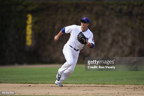 Ryan Theriot of the Chicago Cubs fields against the Houston Astros on April 16, 2010 at Wrigley Field in Chicago, Illinois. The Cubs defeated the...