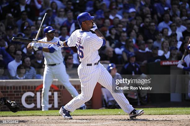 Derrek Lee of the Chicago Cubs hits a three run home run in the seventh inning against the Houston Astros on April 16, 2010 at Wrigley Field in...