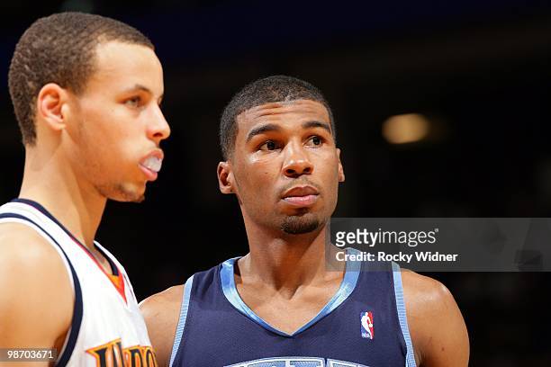 Ronnie Price of the Utah Jazz and Stephen Curry of the Golden State Warriors are shown on the court during the game at Oracle Arena on April 13, 2010...