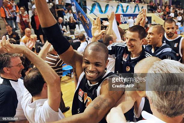 Graveline's players celebrate after winning the French Cup basketball semi-final match Rouen vs. Gravelines on April 27, 2010 at the hall Cotonniers...