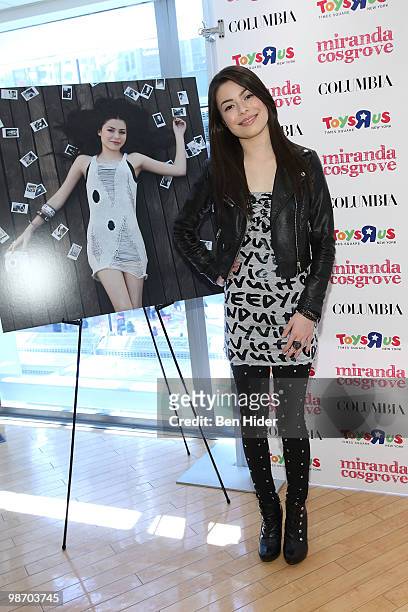 Singer Miranda Cosgrove promotes "Sparks Fly" at Toys"R"Us Times Square on April 27, 2010 in New York City.