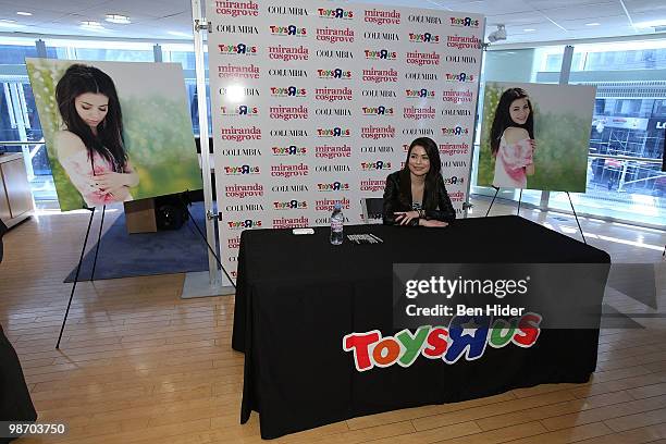 Singer Miranda Cosgrove promotes "Sparks Fly" at Toys"R"Us Times Square on April 27, 2010 in New York City.