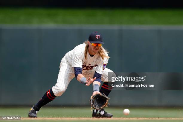 Taylor Motter of the Minnesota Twins makes a play at shortstop against the Texas Rangers during the game on June 23, 2018 at Target Field in...