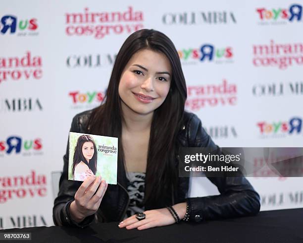 Singer Miranda Cosgrove promotes "Sparks Fly" at Toys"R"Us Times Square on April 27, 2010 in New York City.