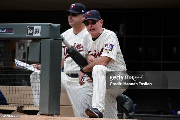 Bench coach Derek Shelton and manager Paul Molitor of the Minnesota Twins look on against the Texas Rangers during the game on June 23, 2018 at...
