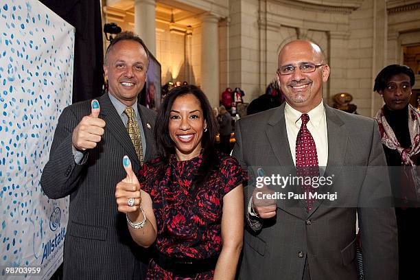 Rep. Ted Deutch , Stacy Sharpe of Allstate and Dean Pappas of Allstate take the pledge at the Allstate 'X the TXT' Washington DC pledge event at Main...