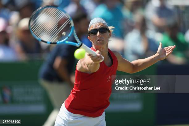 Kirsten Flipkins of Belgium in action against Katie Boulter of Great Britain in the Womens Singles Final match during of the Fuzion 100 Southsea...